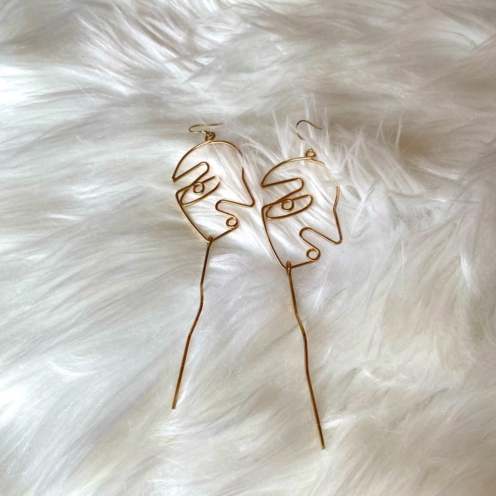 Abstract face earrings
